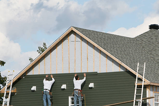 Professional Siding Installation technician working in Severna Park, MD